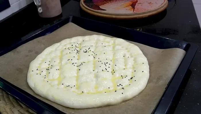 Sprinkle with sesame seeds and/or sanogh (optional).