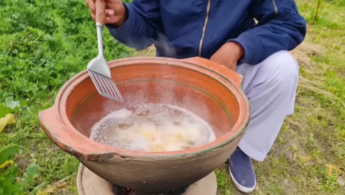 Fry the chicken nuggets in a pan until golden brown.