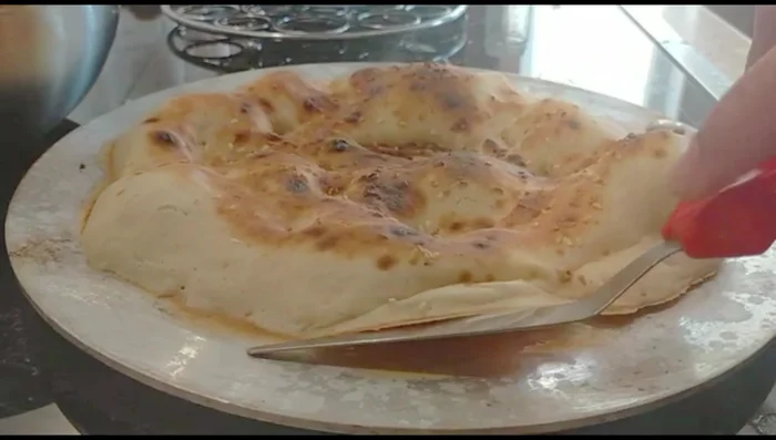 Reduce heat to low and cook for about 2 minutes more until the bread easily releases from the pan.