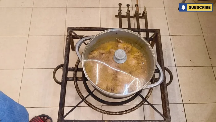 Simmer the pigeon and tomato mixture for 20-25 minutes, allowing the water to reduce.