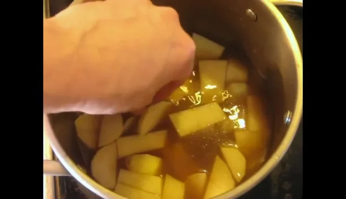Prepare the potatoes: Strain the braising liquid, reserving the stock. Cube potatoes and simmer in the stock with a preserved lemon slice until tender.