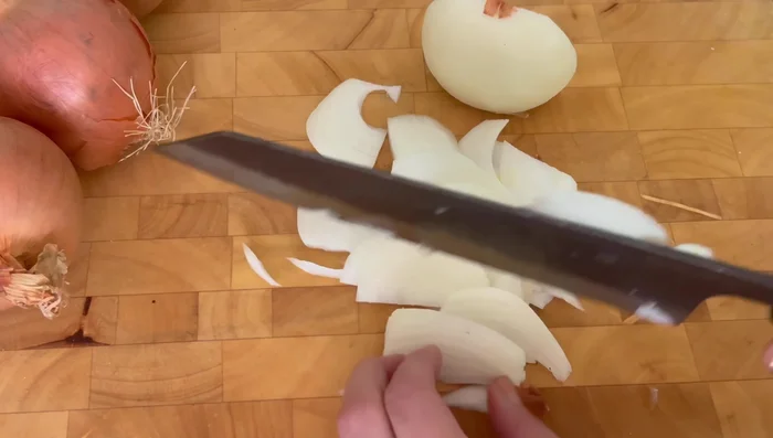 Finely slice 4 large onions.