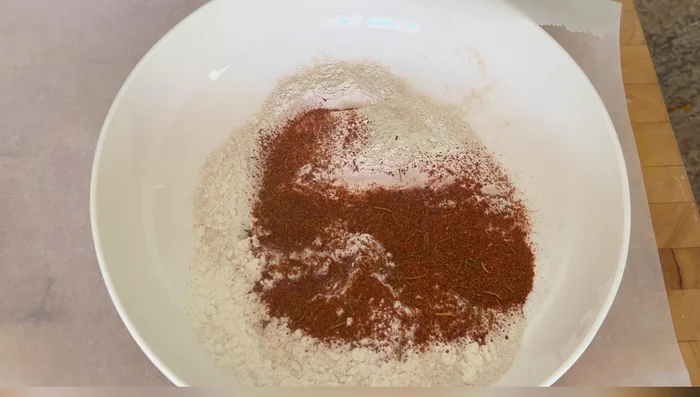 Prepare the fish coating: Mix 1 cup flour with 1 tbsp fish spice, 1 tsp salt, and 2 tsp turmeric.