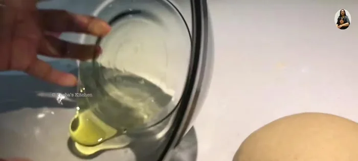 First rise: Grease a bowl, place the dough inside, cover with a damp towel, and let it rise in a warm place for 2 hours.