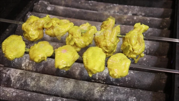 Grill the chicken wings: Preheat your grill to medium-high heat. Grill the skewers, turning every 30 seconds, for about 7-9 minutes, or until cooked through.