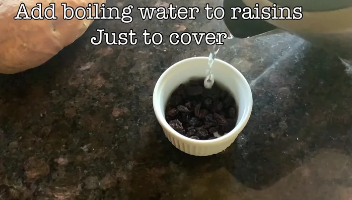 Pour boiling water over raisins to rehydrate. (This step is for later use)