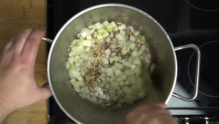 Sauté chopped onions in the rendered duck fat until softened. Add turmeric and cook for another 4-6 minutes.