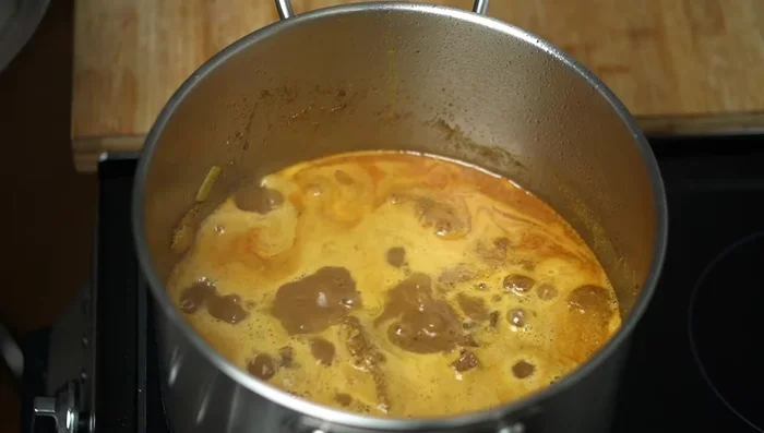 Return duck to the pot. Bring to a simmer, then reduce heat to low, cover, and simmer for two hours (or one hour for chicken).