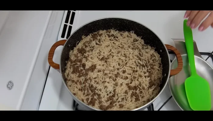 Turn off the heat and let the rice sit, covered, for 15 minutes.