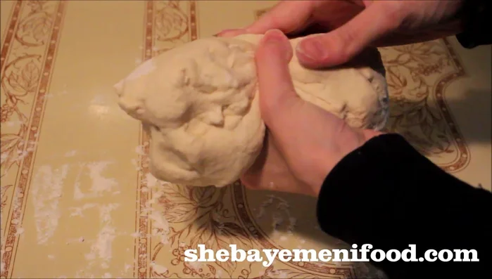 Divide dough into 4-5 equal pieces, shape into balls, cover, and let rest for 20 minutes.