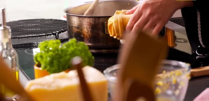 Add two Maggi chicken broth cubes.