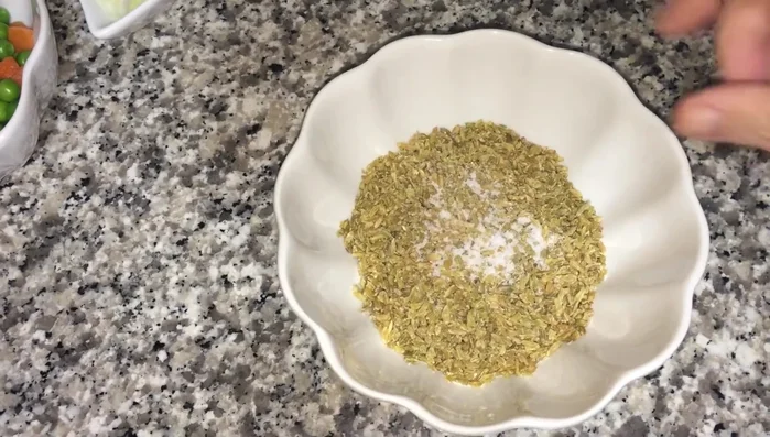 Clean the freekeh thoroughly, removing any small stones. Rinse several times. Add a dash of salt and soak in boiling water until ready to use.