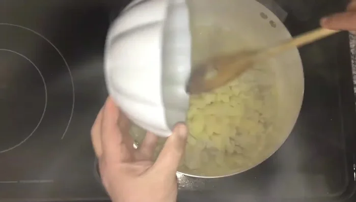 Add the cubed potatoes and sauté briefly to blend flavors.