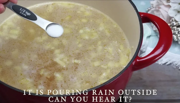 Add water to the pot. Season with salt, cumin, turmeric, and chicken bouillon (or nutritional yeast for vegan).