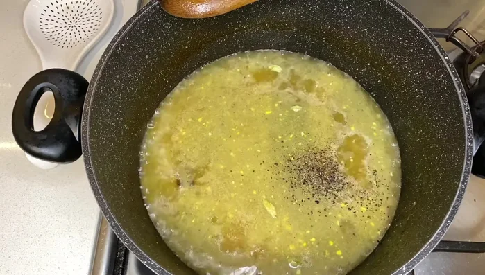 Add black pepper (to taste).