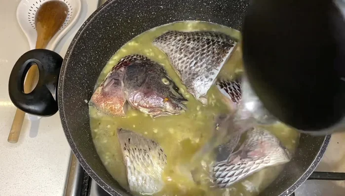 Cover the pot and cook until the fish is ready (approximately 8-10 minutes).