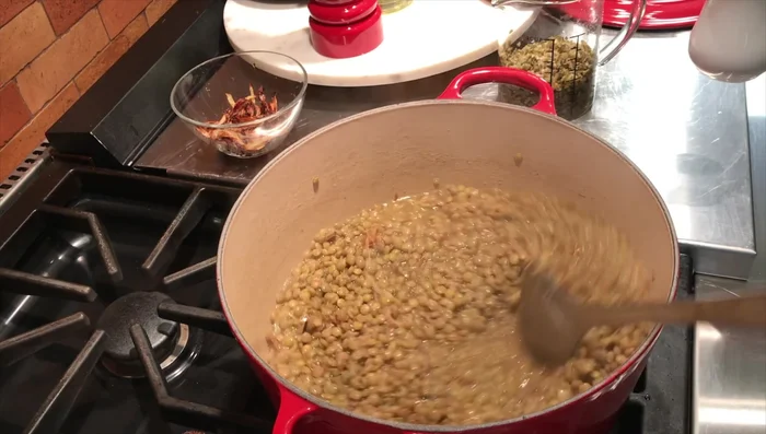 Cook until the lentils and freekeh/rice are done, It's okay to have a little liquid left.