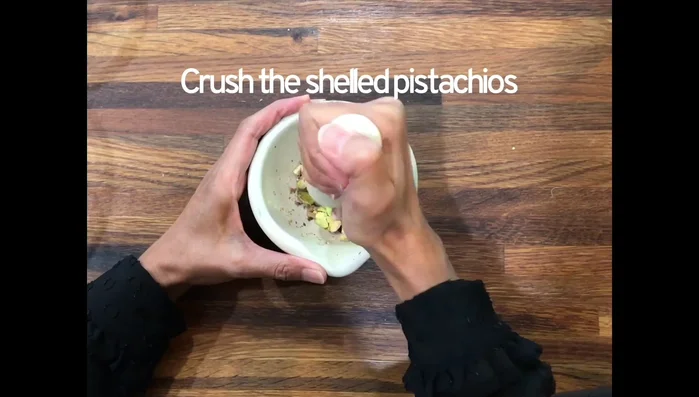 Combine crushed nuts, cinnamon, and brown sugar in a large bowl.