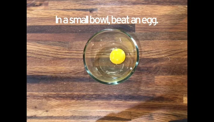 Beat an egg in a separate bowl for the egg wash.