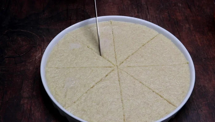 Cut parallel strips on each triangle, creating a diamond pattern.