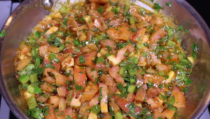 Add minced garlic, a squeeze of lemon juice, and the chopped preserved lemon. Stir.