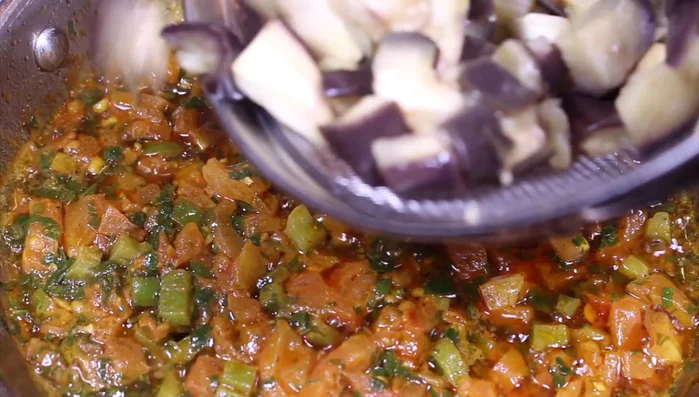 Mix in the eggplant and cook for another 5 minutes over medium-low heat.