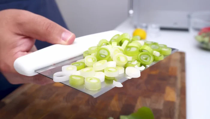 Add diced onions to the bowl.