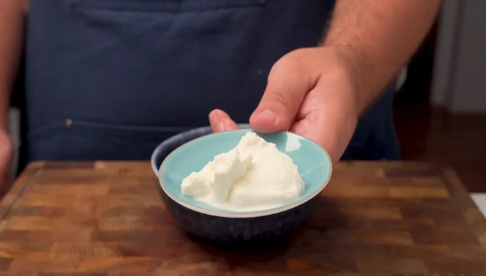 Prepare tahini dressing: Combine yogurt, tahini, lemon juice, salt, pepper, cumin, and chili powder (optional). Add grated garlic.