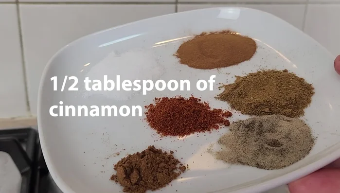 Add spices (salt, cumin, cinnamon, black pepper, white pepper, garam masala, cayenne pepper) and butter to the meat and rice mixture. Mix thoroughly while still warm.