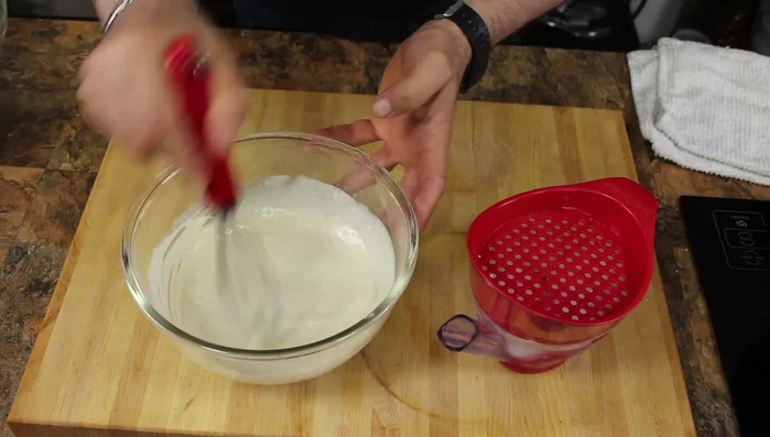 Combine the cooled cauliflower and carrots with the tahini dressing.