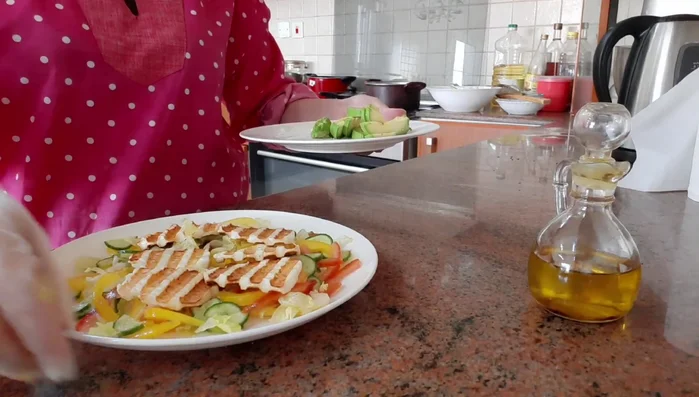 Add avocado slices to the salad.