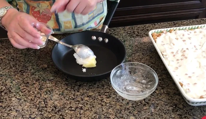 Fry the pine nuts: Melt butter and coconut oil in a pan. Add pine nuts and fry until golden brown.