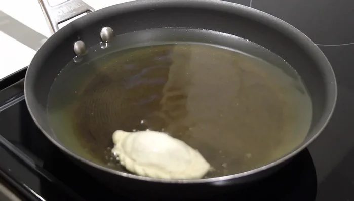Fry the sambousek: Heat oil in a pan. Fry sambousek in batches, turning frequently until golden brown. Drain on a wire rack.