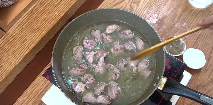 Add enough water to almost cover the beef. Bring to a boil, then reduce heat and simmer until the water evaporates (about 15 minutes). This tenderizes the meat.