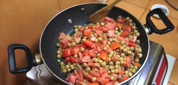 Add fresh tomatoes. Cover and simmer for 4-5 minutes, or until tomatoes break down.