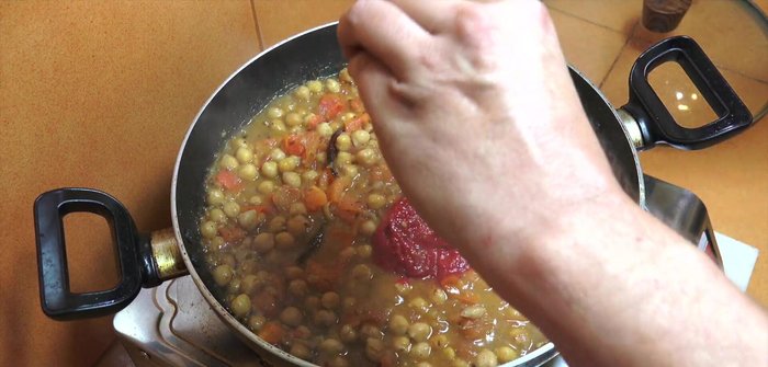 Add tomato puree. Simmer for another 5-6 minutes, stirring occasionally.