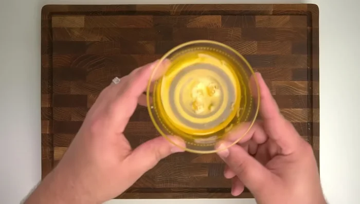 Melt 135g of clarified butter. Set aside 1 tbsp for greasing the pan.