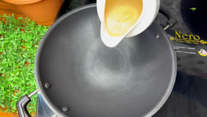 Add tadka to the dal: Heat ghee, add mustard seeds, and red chilli powder. Pour over the dal.