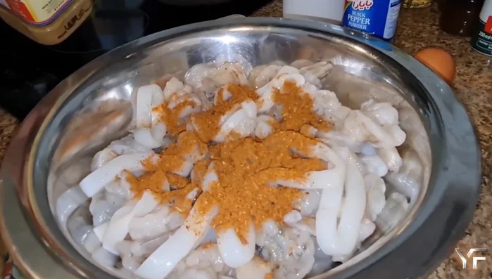 Add two large eggs to the marinade and mix well.