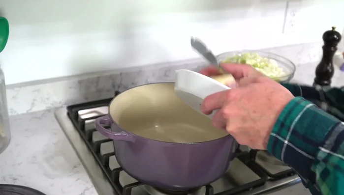 Melt butter in Dutch oven over medium-low heat. Ensure butter doesn't brown (179.739).