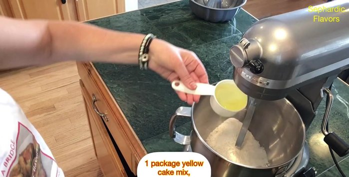 In a mixing bowl, combine cake mix, oil, eggs, and vanilla extract. Mix on low speed until smooth.