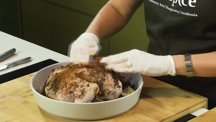Rub the spice mixture well over the chicken.