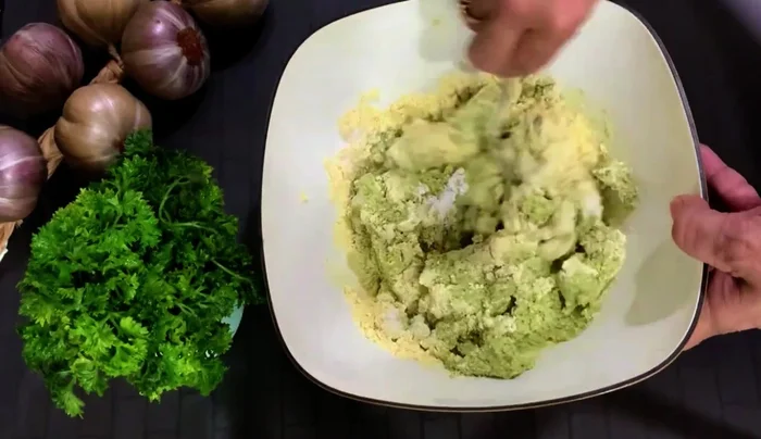 Transfer the mixture to a large bowl. Stir in the gram flour and baking powder.
