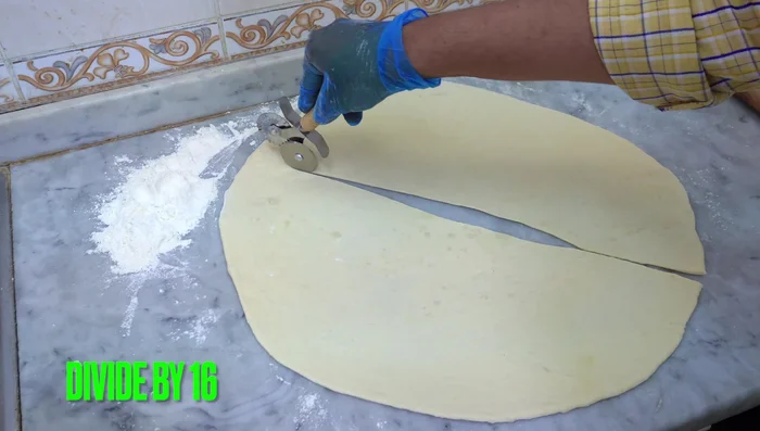 Use a pizza cutter to cut each circle into 16 equal pieces. (143.64)