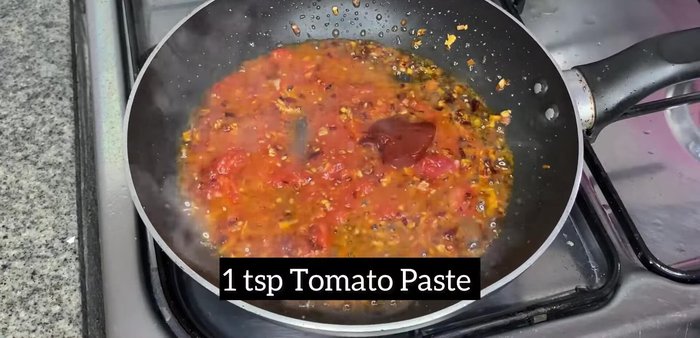 Stir in 1 tsp tomato paste.