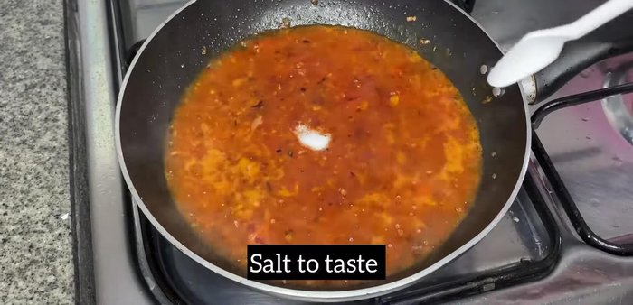 Add salt and spices (1 tsp garam masala, 1 tsp paprika powder). Mix well and cook for 1 minute.