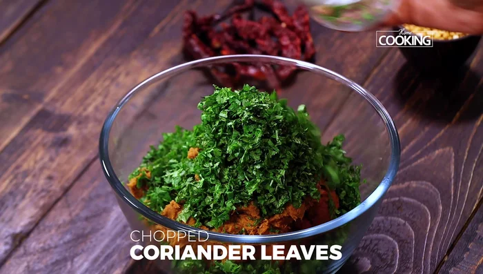 Add chopped mint and coriander, green chili, oil to the meat mixture. Mix well.