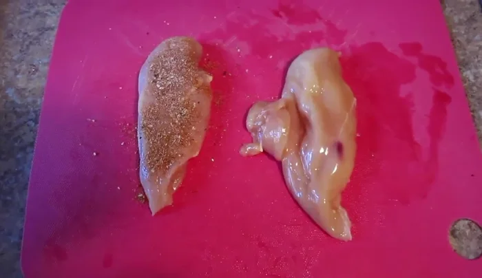 Season both sides of the chicken breasts with chicken shawarma seasoning.
