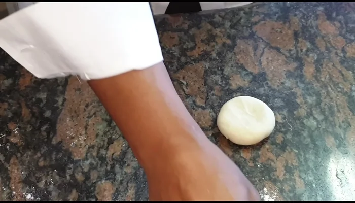 Roll out each roti using dry flour to prevent sticking. Aim for a slightly larger, even circle.