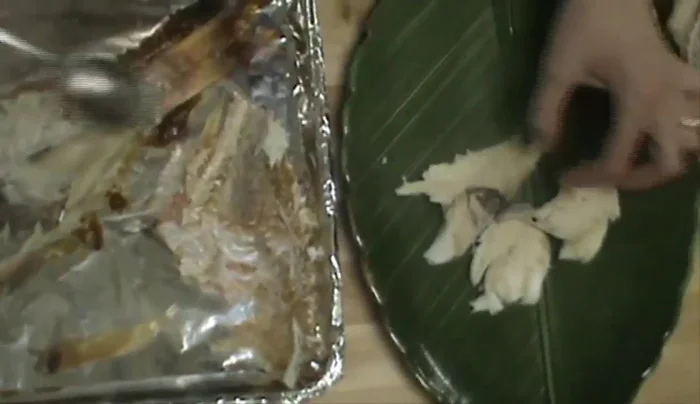 Debone the fish and plate it.
